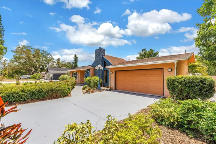 Spacious driveway and 2 car garage.