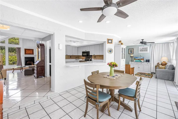 Versatile dining room with pool views.