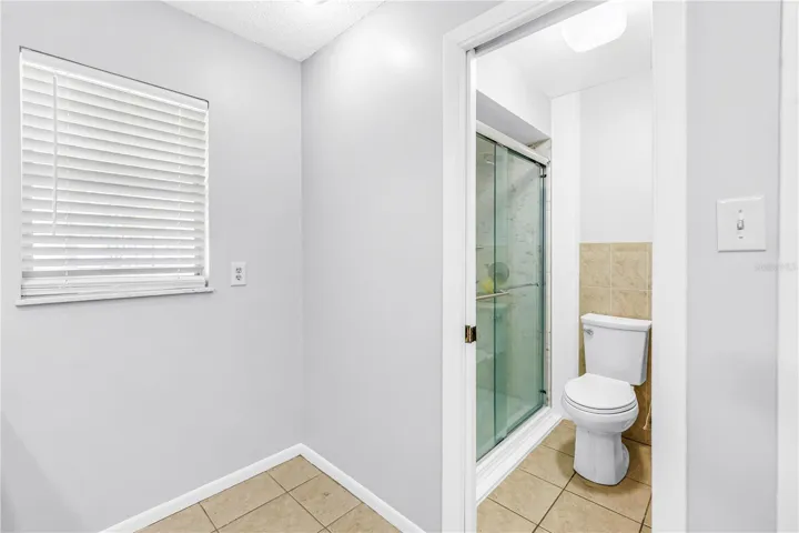 Separate shower and water closet.