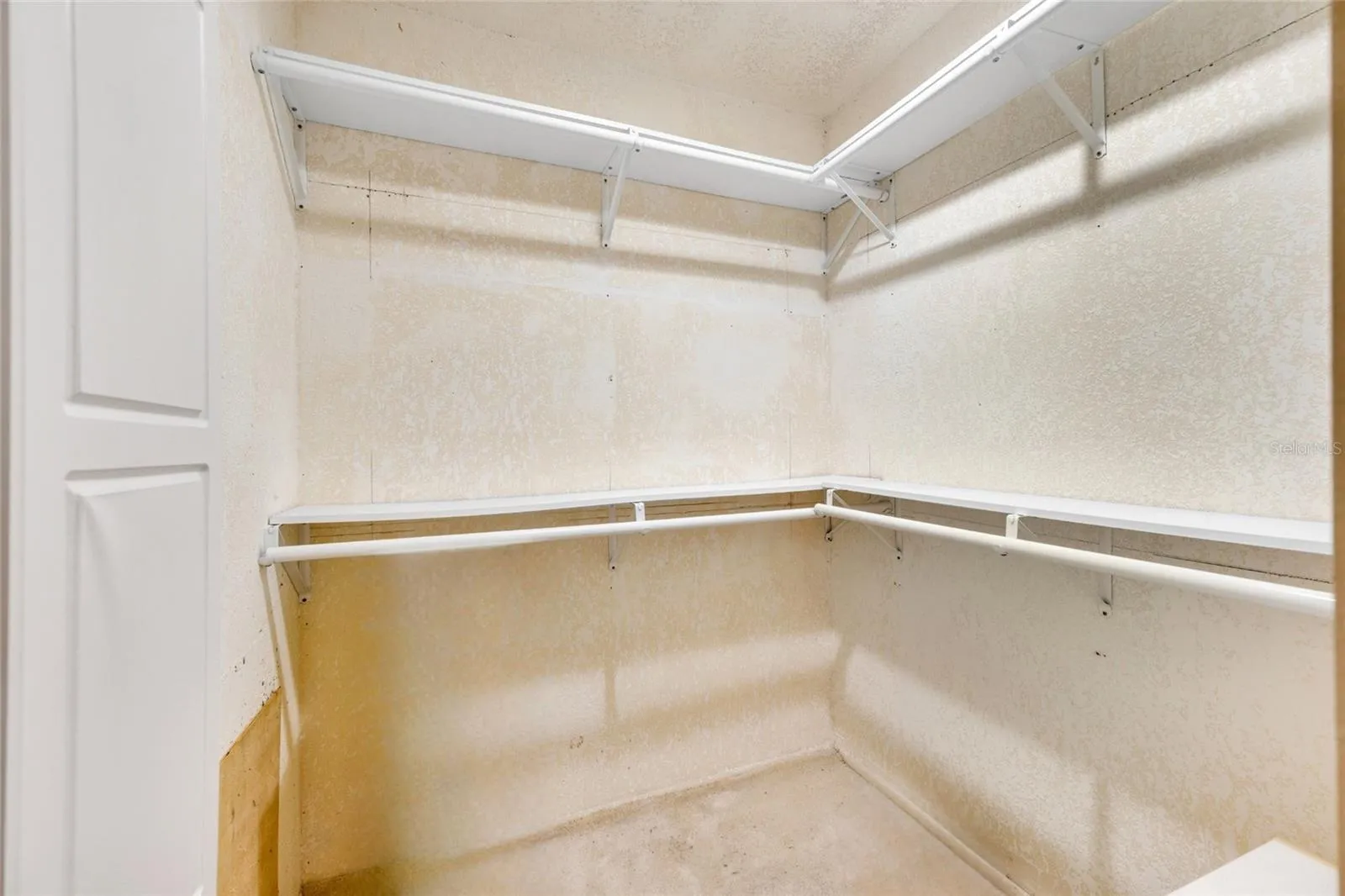 SPACIOUS WALK IN CLOSET IN MASTER BEDROOM