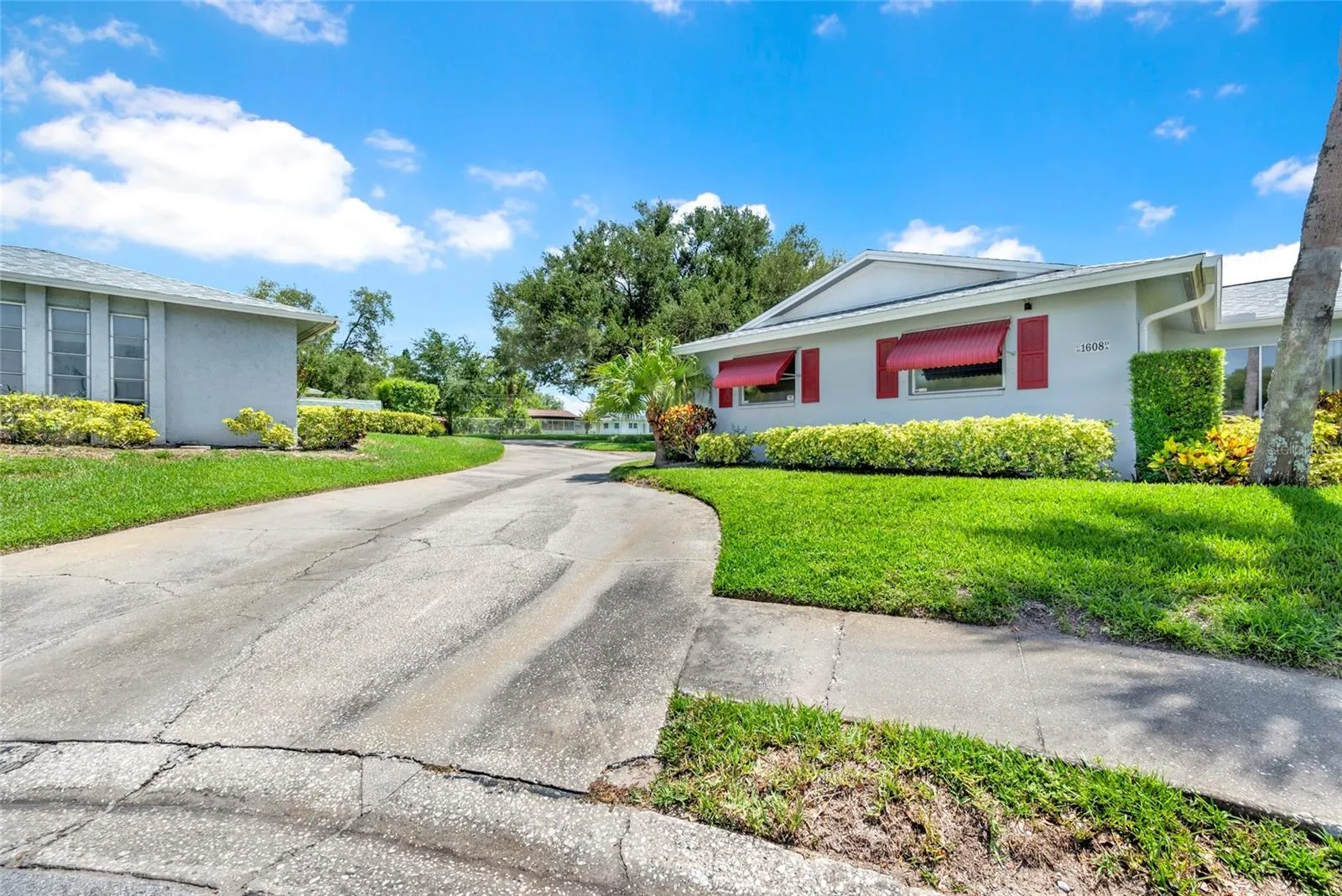 FRONT VIEW WITH DRIVEWAY