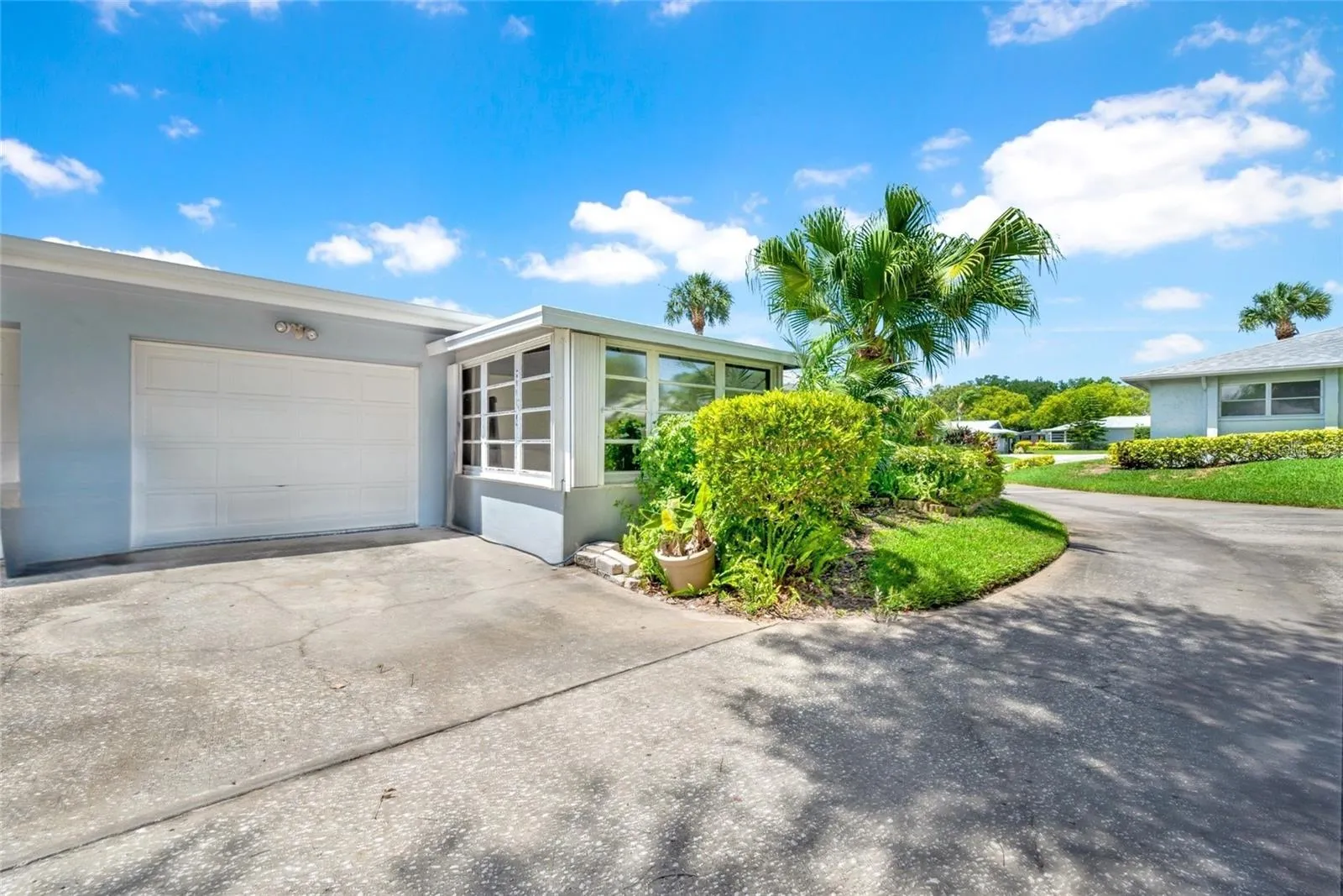 DRIVEWAY WITH ONE CAR GARAGE