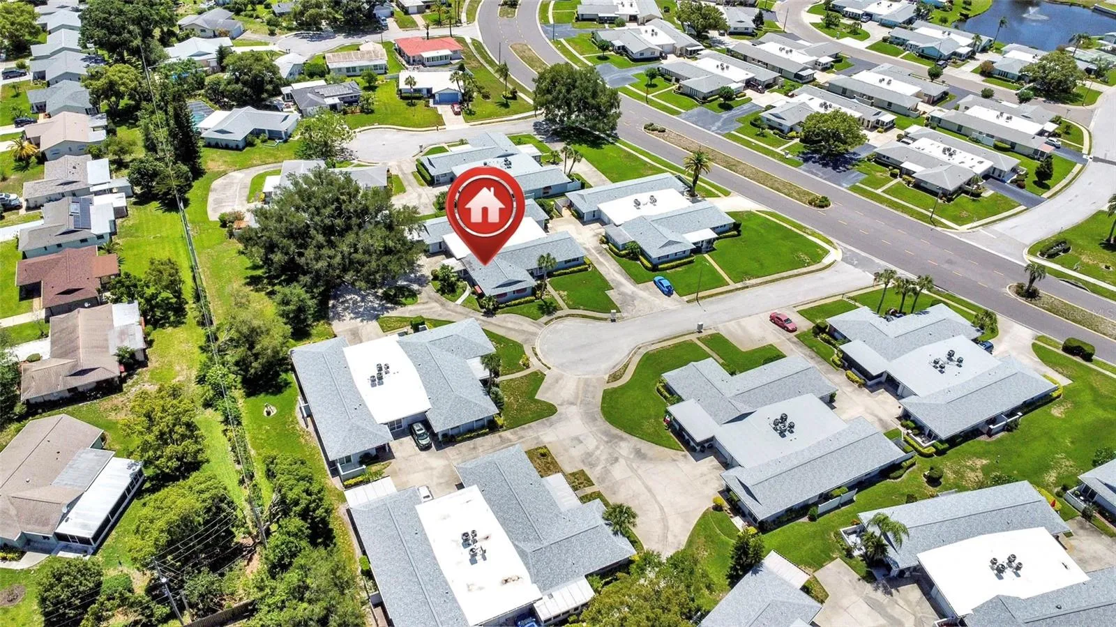 AERIAL VIEW OF CONDO WITH GREEN SPACE