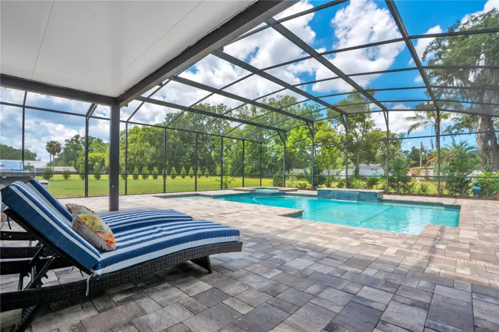Paver Deck, Screened, Salt Water Pool and Spa, Both Gas Heated, Water and Fire Feature