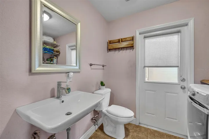 Half Bath and Laundry Area
