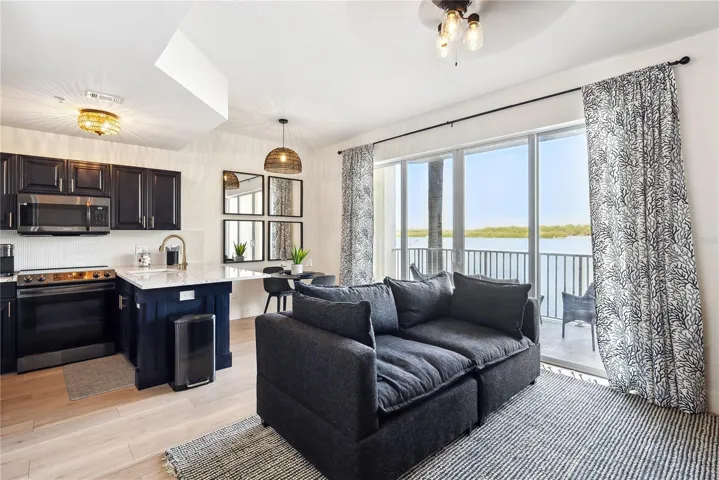 View of Living room, kitchen with Cambria Quartz 