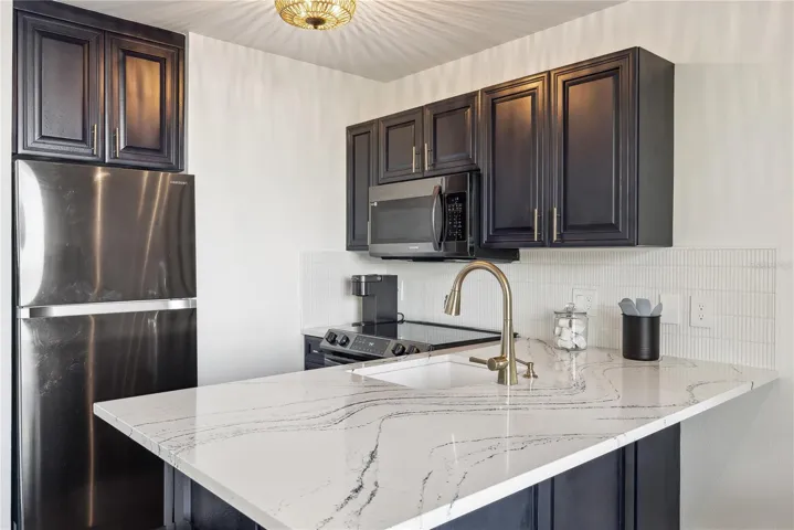 Spacious kitchen with Cambria Quartz 