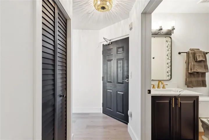 View of foyer and bathroom