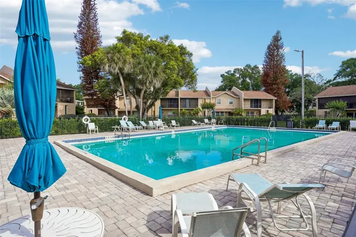 Residents of Park Lake Townhouses enjoy a SPARKLING COMMUNITY POOL along with HOA-covered trash collection, lawn care and exterior maintenance.