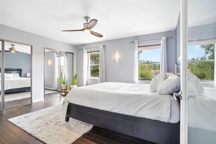 The Primary Bedroom features ATTRACTIVE HARDWOOD FLOORING and offers double mirrored closet doors.
