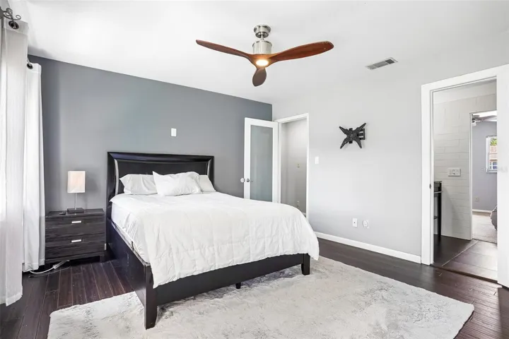 The Primary Bedroom features ATTRACTIVE HARDWOOD FLOORING and offers double mirrored closet doors.