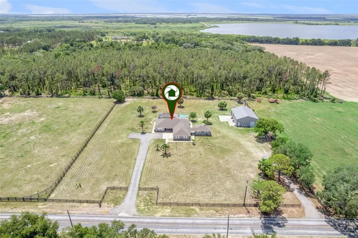Front Exterior Aerial towards Emeralda Marsh