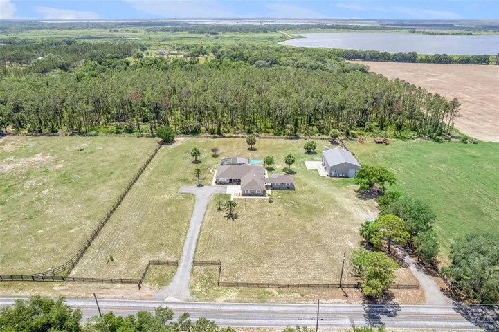 Front Exterior Aerial towards Emeralda Marsh