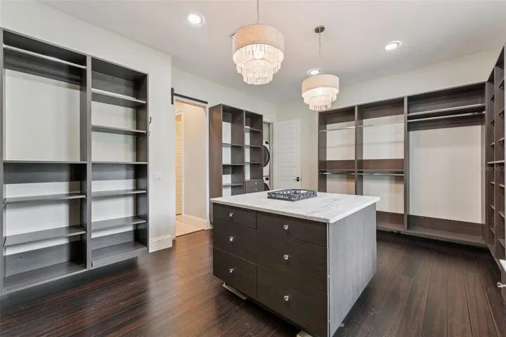 Look at this closet, additional full washer and dryer in here as well