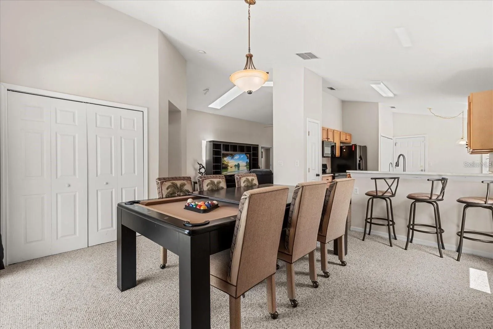 Open layout with seamless flow between the dining area and kitchen