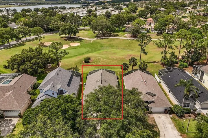 Aerial view highlighting the home's location on the golf course