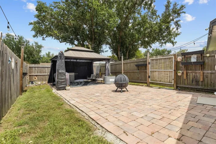 Cooking area behind pool cage