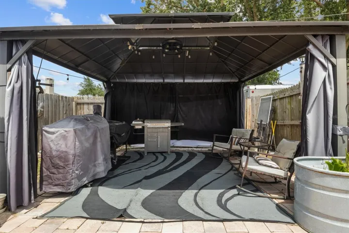 cooking area behind pool   cage