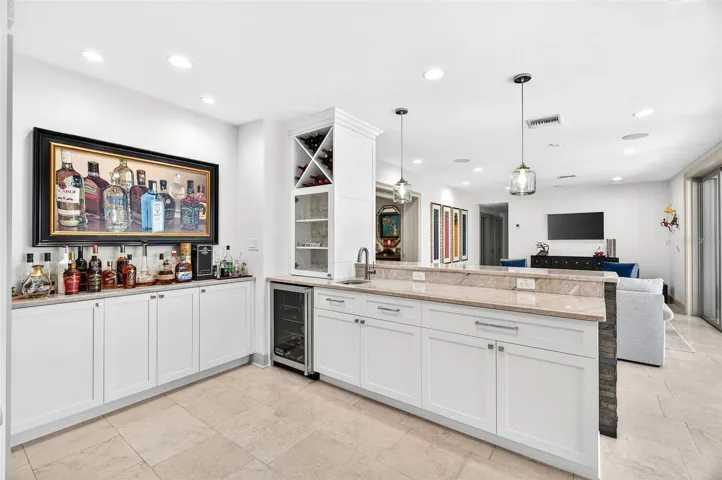 Hospitality bar with quartzite counters, stainless sink & Brizio faucet