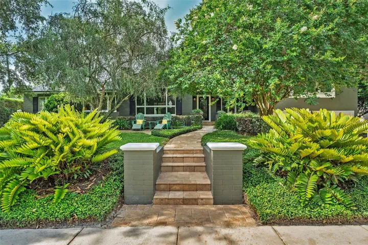 Inviting and lovely Travertine stairs and walkway to entrance