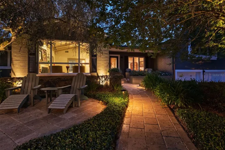 Front entrance with landscape lighting