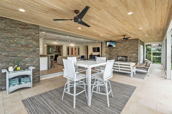 Tongue & groove ceilings, recessed lighting and travertine floors