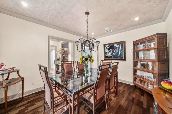 Dining space with convenient swinging glass door to wet bar area and Kitchen