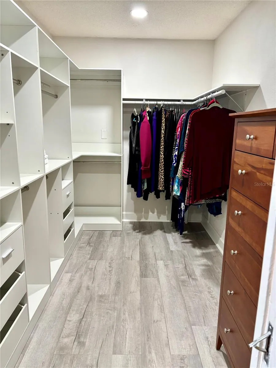 Large closet in primary bedroom.