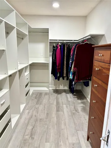 Large closet in primary bedroom.
