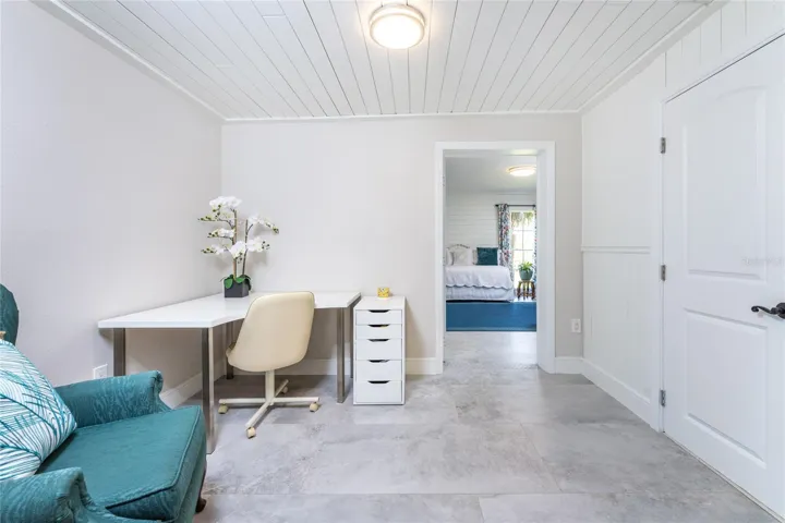A dedicated home office space provides a quiet, organized environment to work from home while maintaining an open feel.