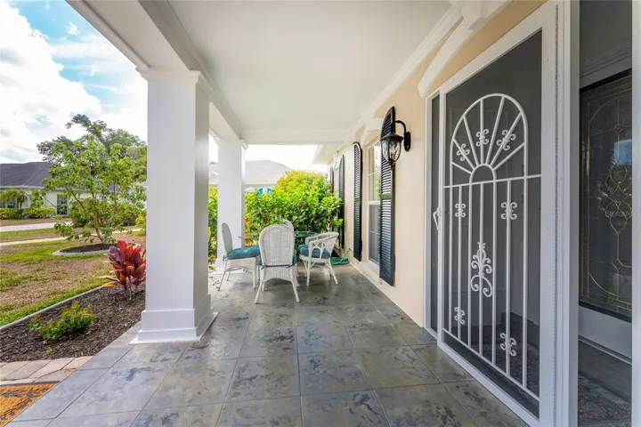 Charming Covered Front Porch.