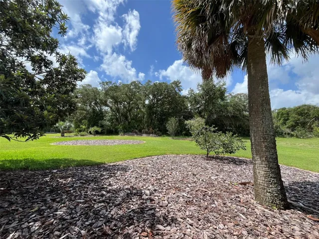 PRIVACY and PLAY TIME will be the focus of this ONE ACRE YARD.  A Garden would be easy to plant in this yard, too.