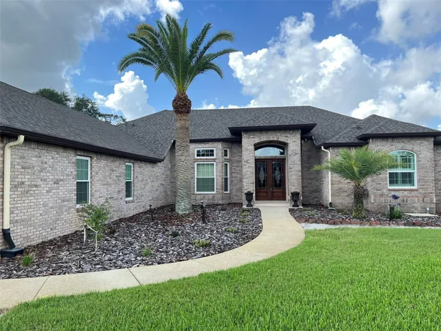 Welcome HOME to your POOL HOME set on ONE ACRE with 5 Bedrooms, 3 full Bathrooms, 3 Car Garage PLUS a detached 1 Car Garage, Hurricane Shutters and a FULL HOUSE GENERATOR!