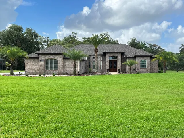 Welcome HOME to your POOL HOME set on ONE ACRE with 5 Bedrooms, 3 full Bathrooms, 3 Car Garage PLUS a detached 1 Car Garage, Hurricane Shutters and a FULL HOUSE GENERATOR!