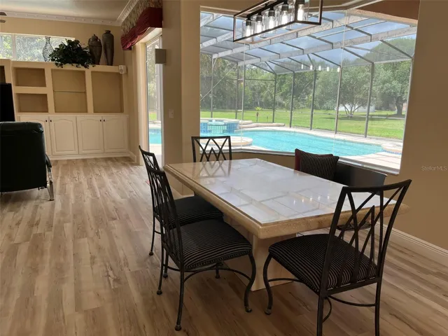 Eating in the cafe' overlooking the pool and your beautiful yard will never get old.