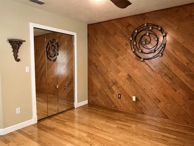 Bedroom 2:  This bedroom has an en suite bathroom, ceiling fan and a mirrored closet.