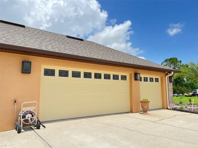 Three Car Garage and remember there is a one car detached garage, too.