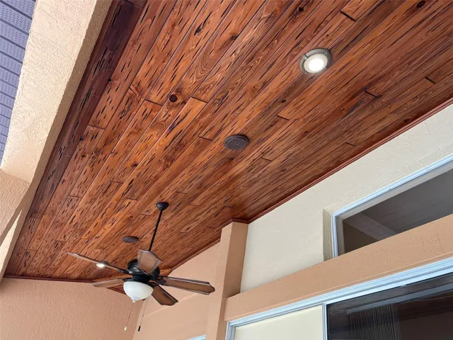 The covered porch has PECKY CYPRESS WOOD ceiling and it is really pretty and stands up to the weather in Florida.
