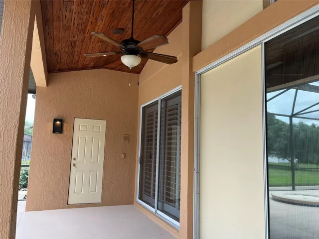 The covered porch has PECKY CYPRESS WOOD ceiling and it is really pretty and stands up to the weather in Florida.