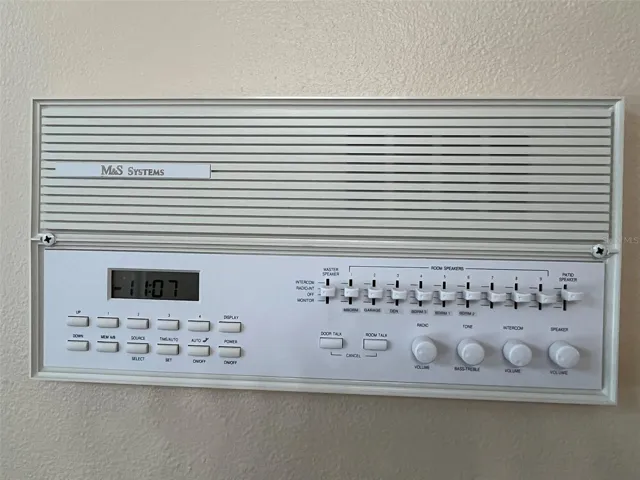 This main panel to the intercom system is in the kitchen.  Play music throughout your home or call everyone to dinner without having to yell or leave the kitchen to do it.