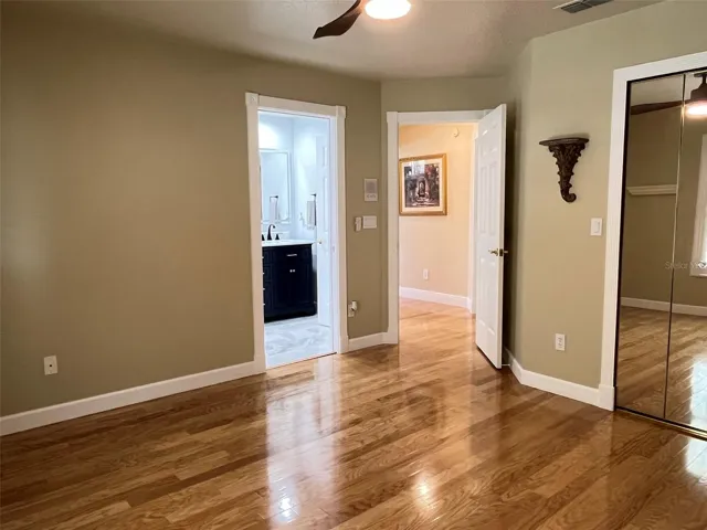 Bedroom 2:  This bedroom has an en suite bathroom, ceiling fan and a mirrored closet.