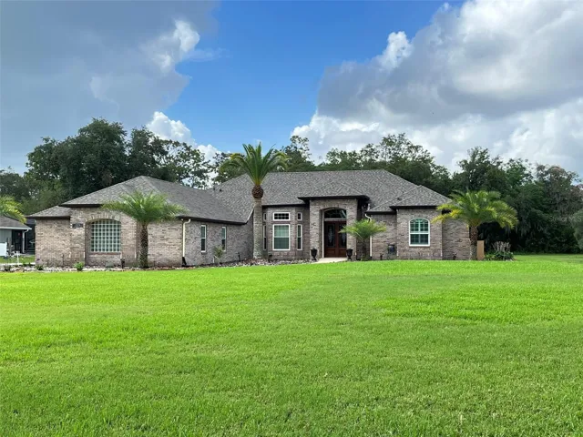 Welcome HOME to your POOL HOME set on ONE ACRE with 5 Bedrooms, 3 full Bathrooms, 3 Car Garage PLUS a detached 1 Car Garage, Hurricane Shutters and a FULL HOUSE GENERATOR!