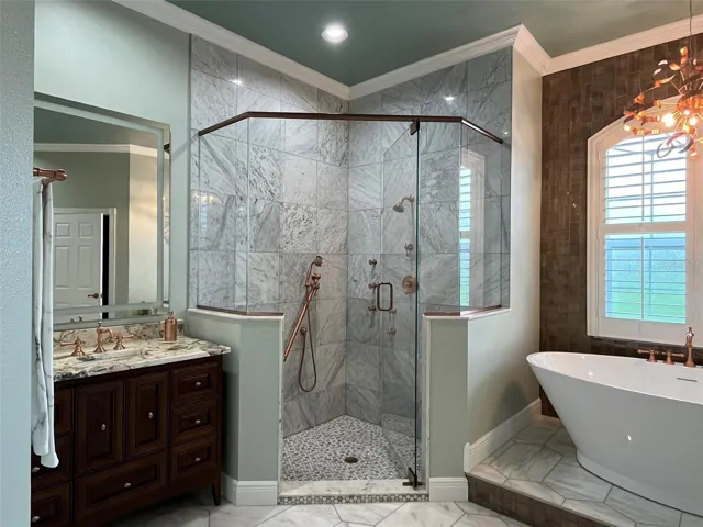 Shower head and a hand wand makes rinsing off a breeze.