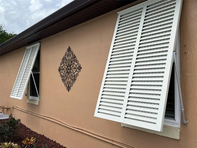 Hurricane shutters all all around the house.