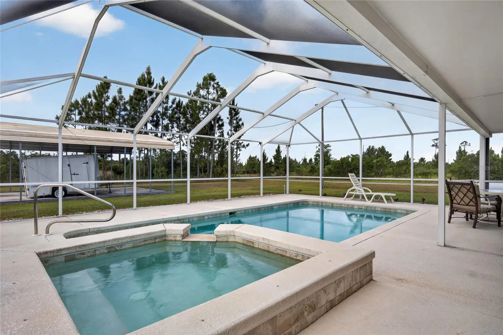 HEATED SPA AND POOL CAGE