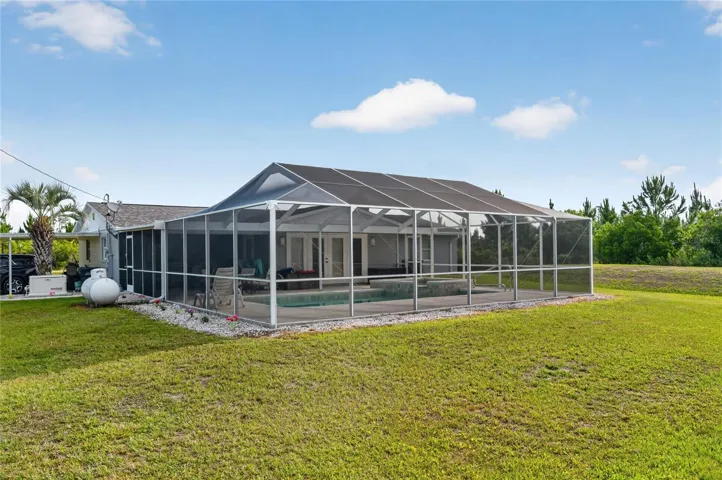 BACKYARD VIEW OF POOL CAGE