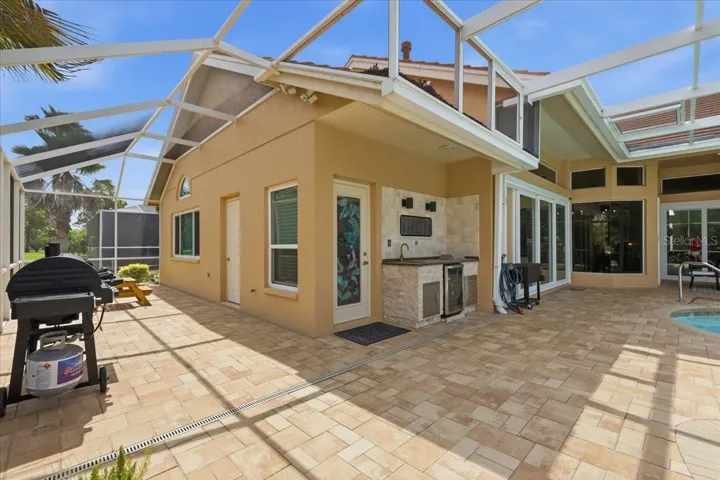 Outdoor kitchen and additional storage area