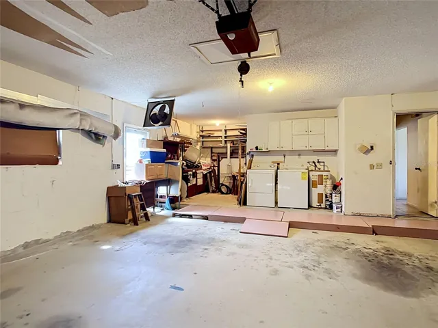 Oversized 2-car garage with workshop space and storage