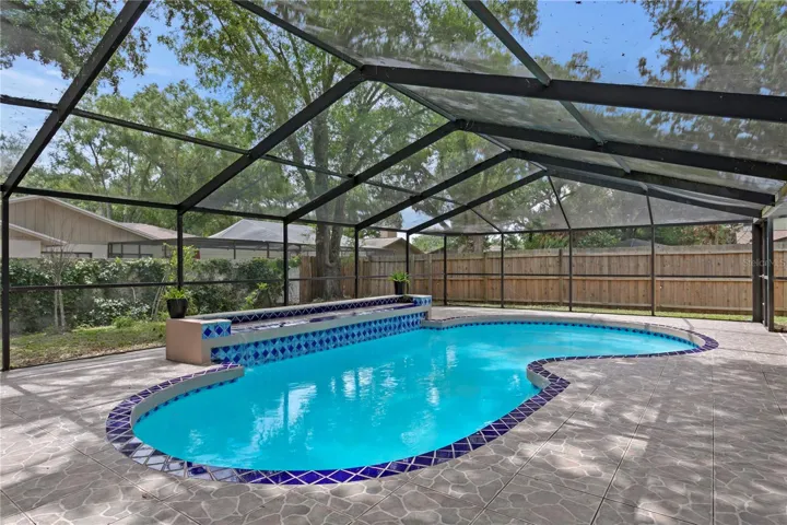 Pool with waterfall feature