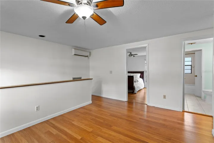 Second floor loft/flex space with hard wood floors and mini split AC